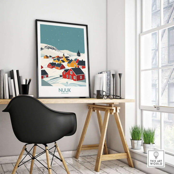 Vibrant Nuuk Greenland travel print displayed in a modern workspace with a black chair and wooden desk.