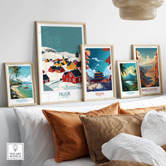 Nuuk Greenland Travel Print displayed among other travel prints on a stylish shelf, showcasing vibrant landscapes and colors.
