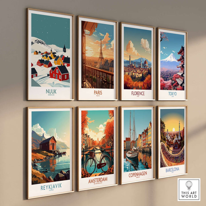 Colorful travel prints of Nuuk, Paris, Florence, Tokyo, Reykjavik, Amsterdam, Copenhagen, and Barcelona on a gallery wall.