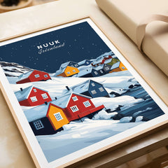Nuuk Greenland Wall Art showing colorful houses in a snowy landscape, beautifully framed for home decor.