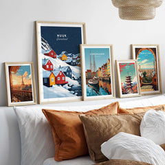 Nuuk Greenland Wall Art displayed among other city wall art on a cozy couch