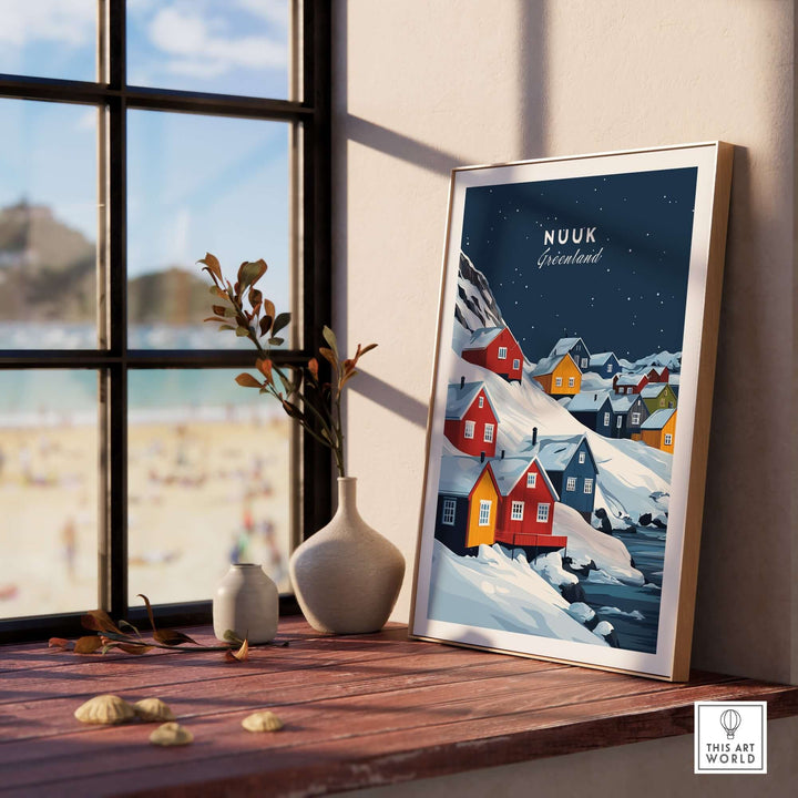 Nuuk Greenland wall art featuring colorful houses against a snowy landscape, displayed in a stylish room setting.