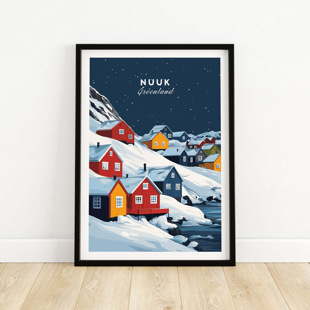 Framed wall art of Nuuk, Greenland showcasing colorful houses against a snowy landscape and night sky.