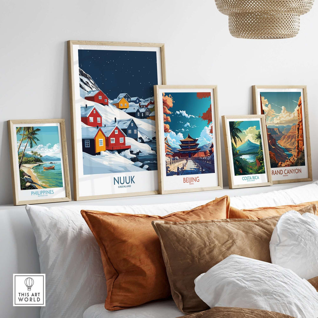 Colorful art prints including Nuuk, Beijing, and Costa Rica displayed on a cozy couch in a stylish living room.