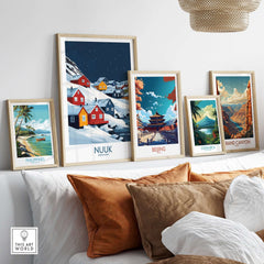 Decorative display of travel posters including Nuuk Poster Greenland, showcasing vibrant art from various locations.