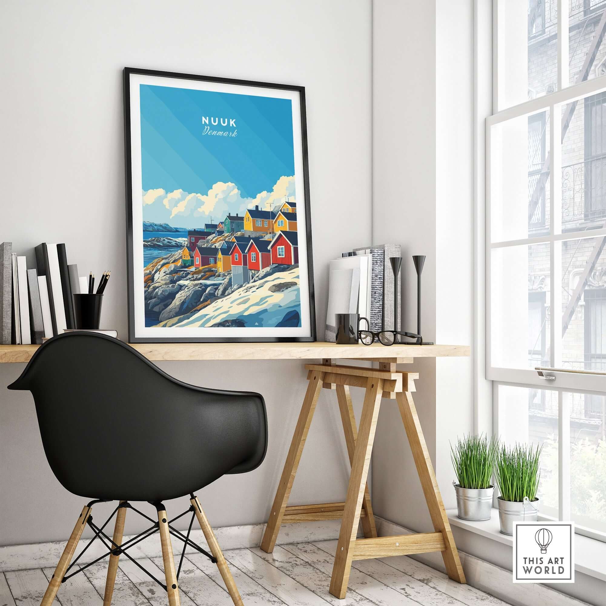Nuuk Travel Print displayed in a stylish home office setting with modern decor and vibrant colors.