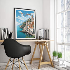 Amalfi Coast Italy travel poster in a modern interior setting, showcasing picturesque seaside views and pastel colors.