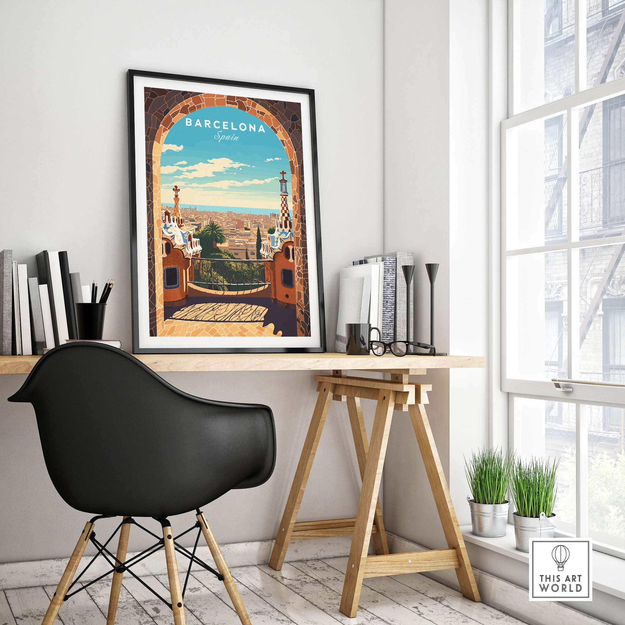 Barcelona poster in a stylish workspace, featuring Park Güell's vibrant design and colors, showcasing Catalonia's beauty.