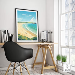 Daymer Bay Cornwall print on a wall in a modern workspace, showcasing serene beach landscape for relaxation.