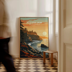 Framed Pacific Rim National Park travel poster with sunset coastal art leaning on wall