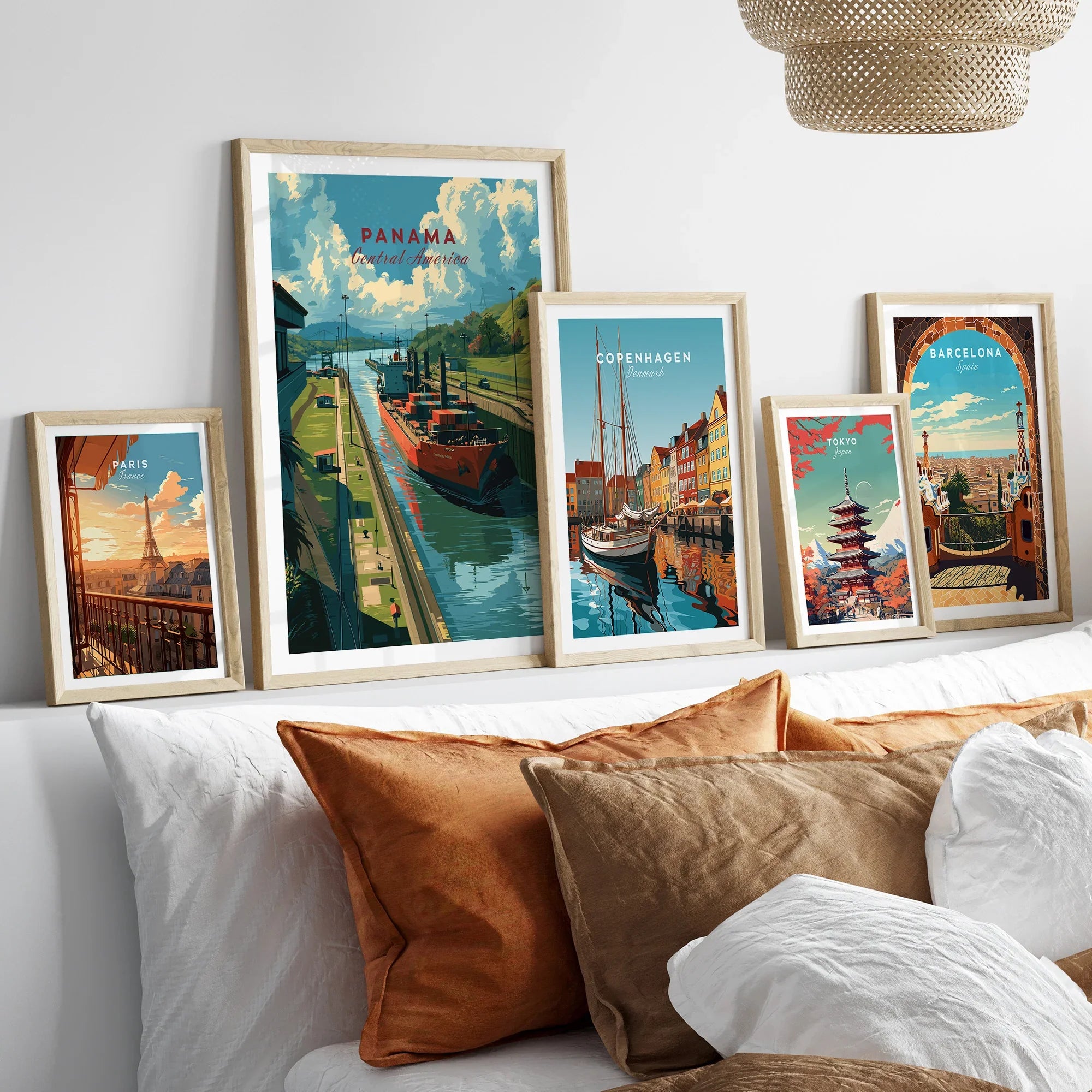 Framed travel posters of Paris, Panama, Copenhagen, Tokyo, and Barcelona for wall art decor