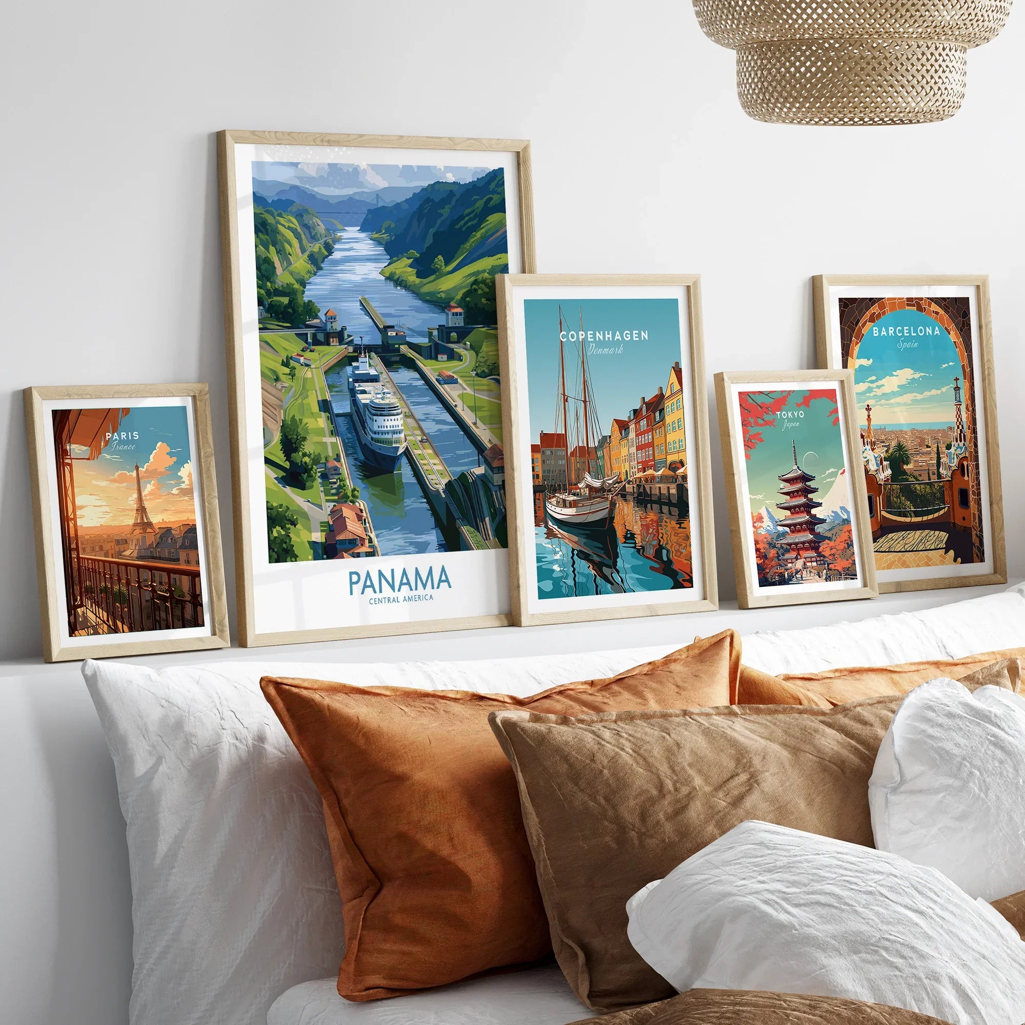 Framed travel posters of Paris, Panama, Copenhagen, Tokyo, and Barcelona for wall art decor