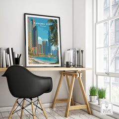 Panama City travel poster with skyline, palm trees, and beach, framed above a modern desk for home decor.