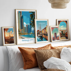 Framed travel posters of Paris, Panama City, Copenhagen, Tokyo, and Barcelona for wall art decor