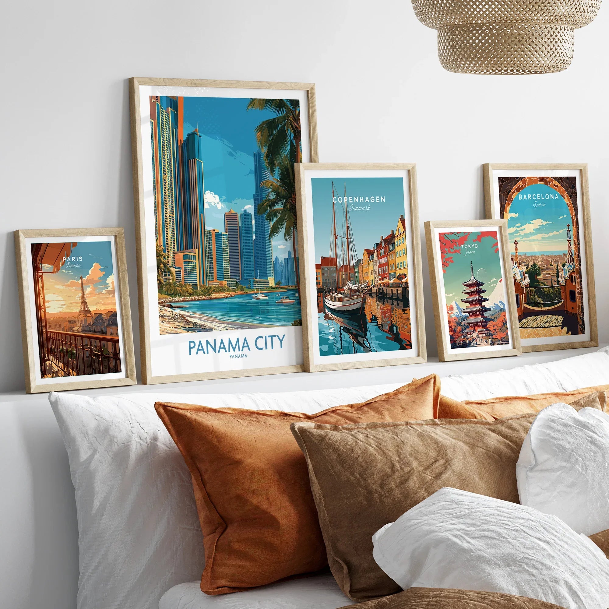 Framed travel posters of Paris, Panama City, Copenhagen, Tokyo, and Barcelona for wall art decor