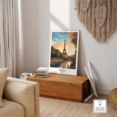 Paris art print featuring the Eiffel Tower at sunset, displayed in a stylish living room setting.