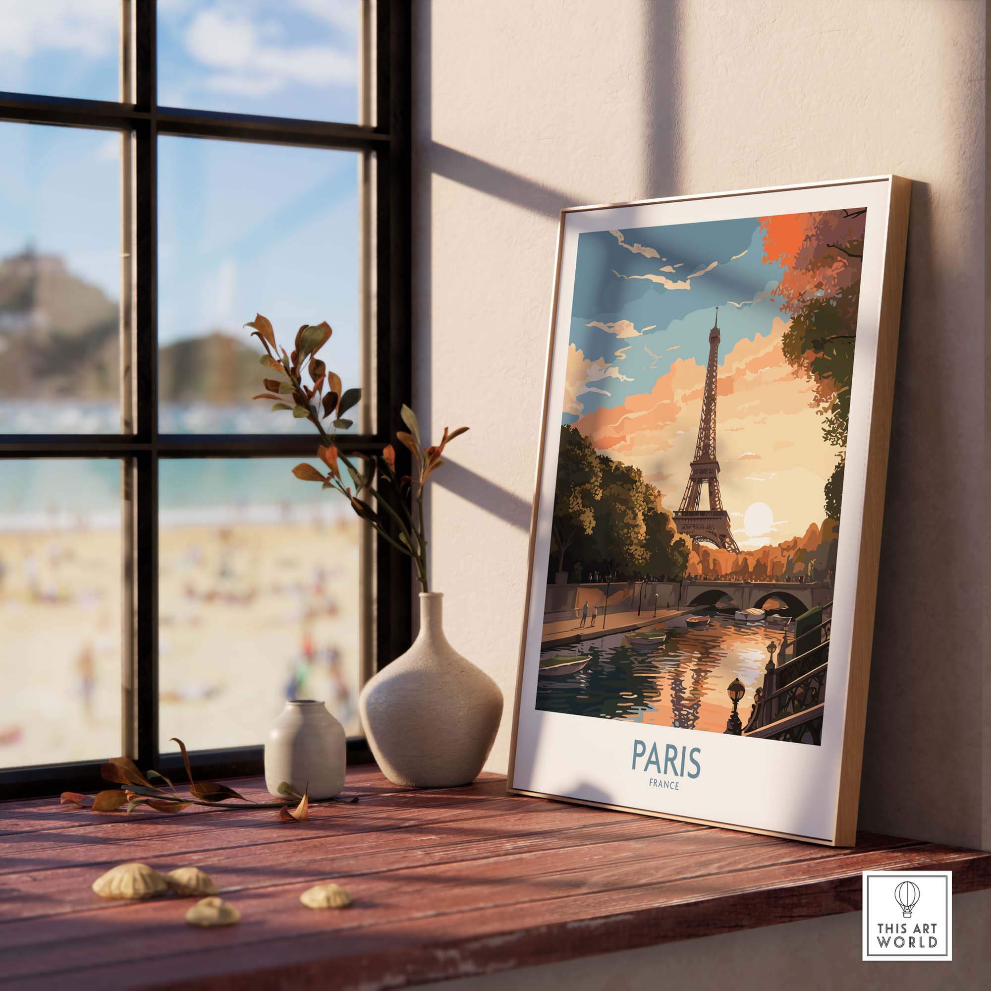 Paris art print featuring the Eiffel Tower at sunset, displayed in a stylish frame by a window. Perfect for home decor.