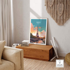 Paris poster featuring the Eiffel Tower, displayed in a stylish living room setting with natural light.