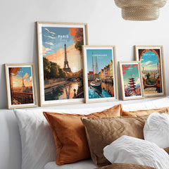 Paris-inspired artwork showcasing the Eiffel Tower, framed prints of iconic cities on a cozy bed setting.
