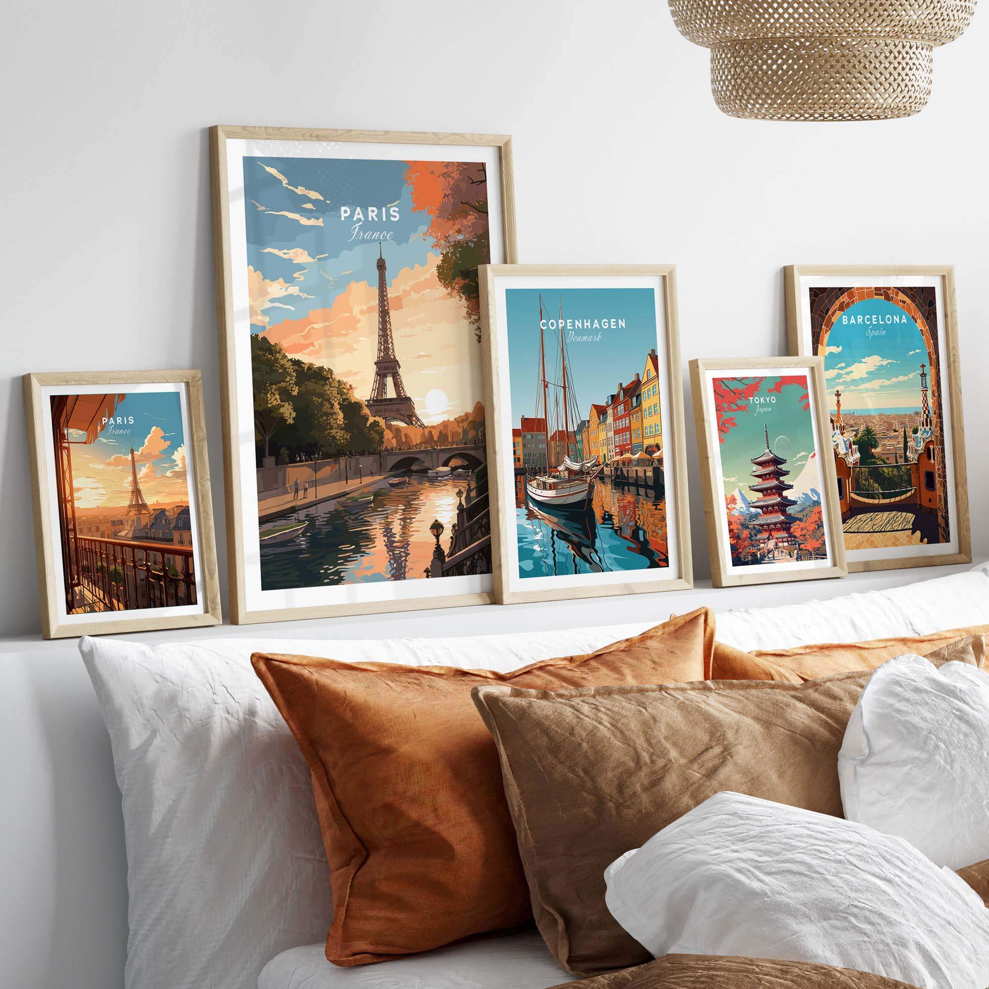 Paris-inspired artwork showcasing the Eiffel Tower, framed prints of iconic cities on a cozy bed setting.