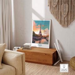 Paris Wall Art featuring the Eiffel Tower, showcasing a stunning view in a cozy living room setting. Perfect for travel enthusiasts.
