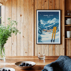 Park City Ski Wall Art Print Utah framed print with snow-covered mountains and skis in a cozy room setting.