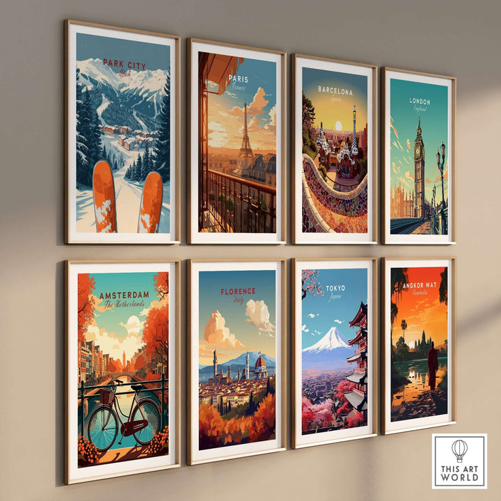 Colorful wall display of travel art prints featuring Park City, Paris, Barcelona, London, and more on a stylish interior.