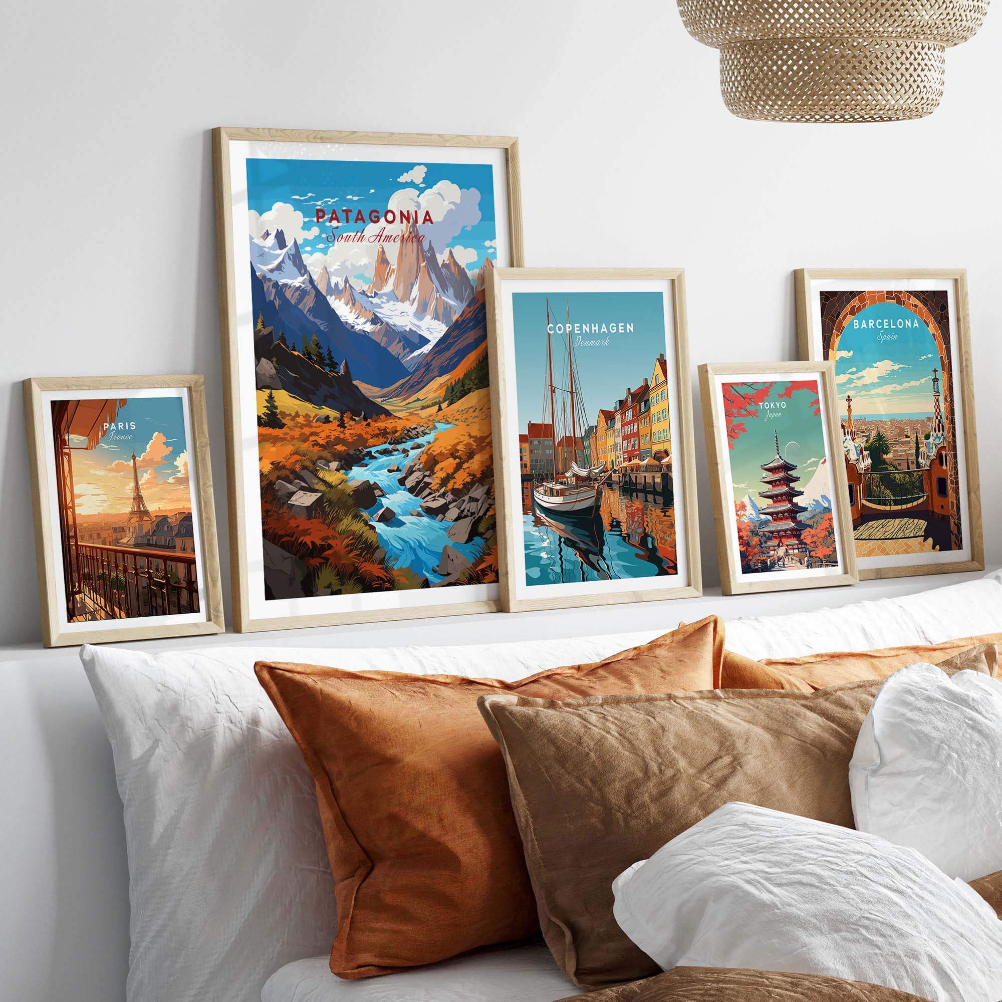 Framed Patagonia Poster among other travel posters, showcasing vibrant landscapes and city scenes for a stylish gallery wall.