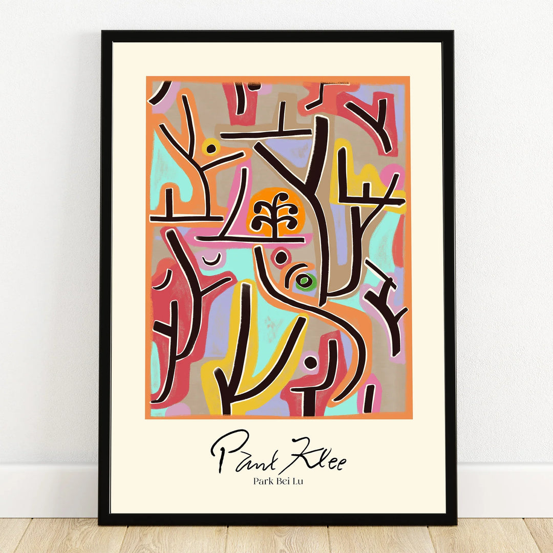 Framed abstract art print with colorful geometric shapes and black lines on a beige background