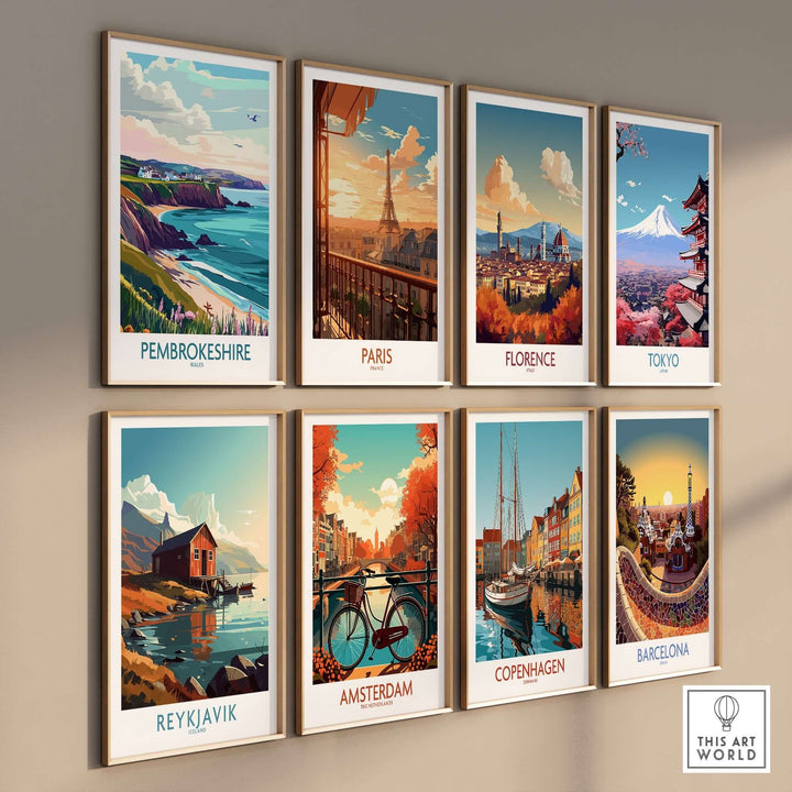 Collection of vibrant travel prints featuring famous cities including Pembrokeshire, Paris, and Tokyo, arranged on a wall.