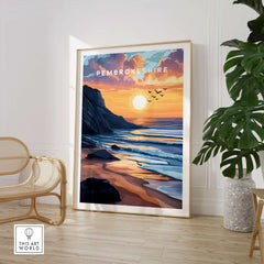 Pembrokeshire Coast Wales Travel Print featuring a stunning sunset over the ocean.