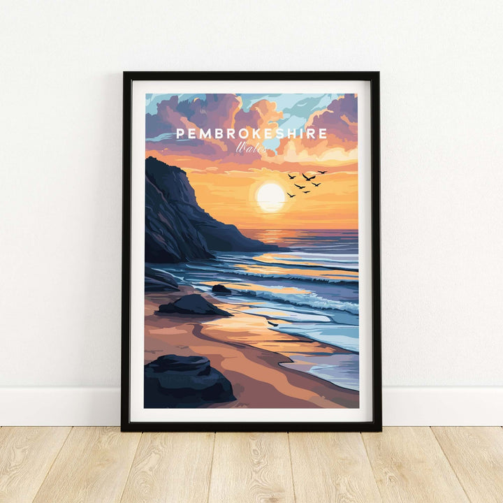 Pembrokeshire Coast Wales travel print featuring a sunset over the beach with waves and cliffs in a stylized illustration.