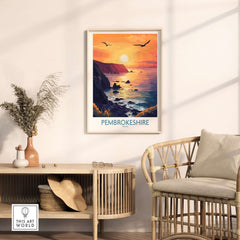 Pembrokeshire Coast Wales Wall Art Print featuring a vibrant sunset over the coastline in a modern living room decor.