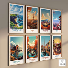 Pembrokeshire Poster and various vibrant travel posters displayed in a stylish arrangement on a wall.