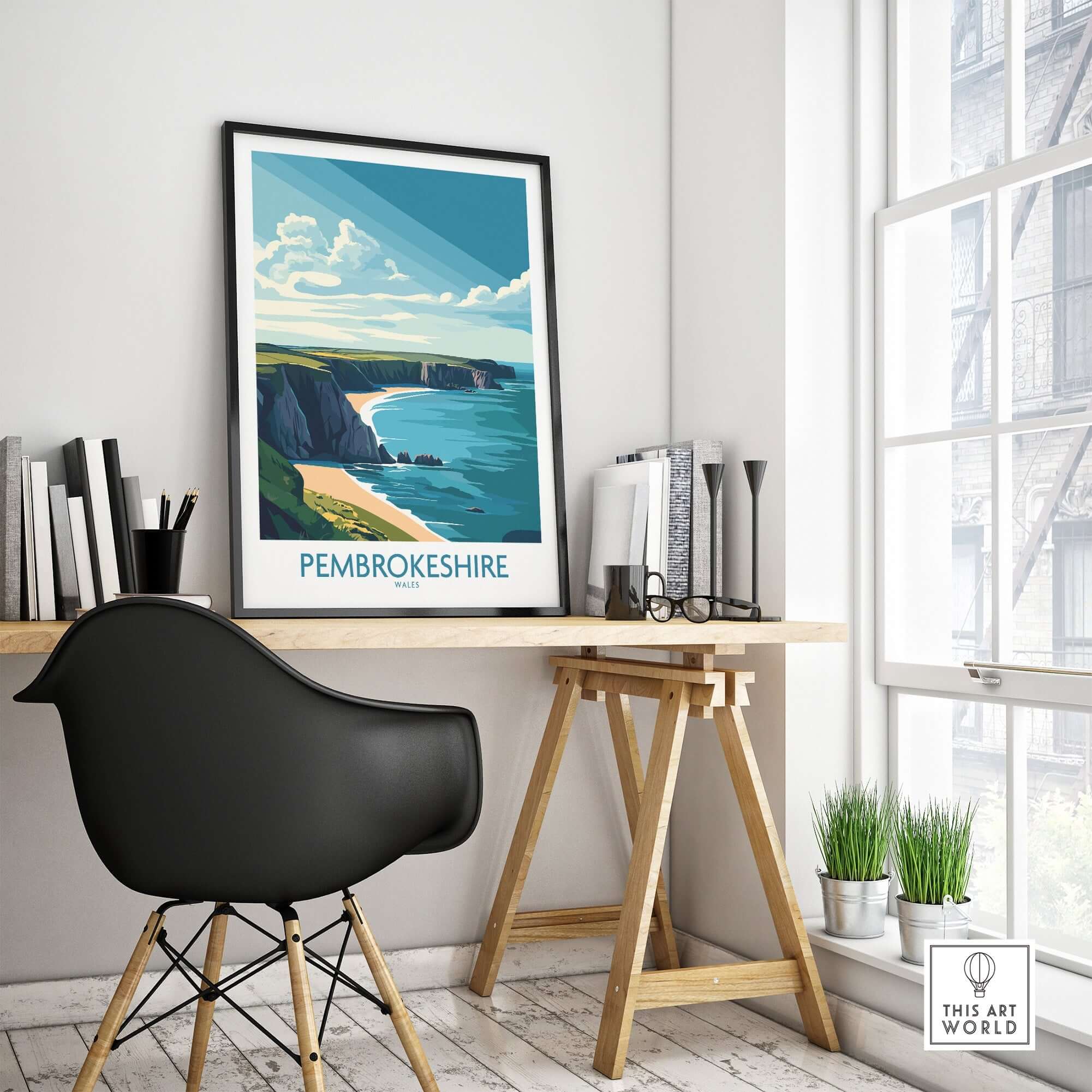 Pembrokeshire Poster Wales displayed in a modern workspace, showcasing Pembrokeshire's stunning coastline.