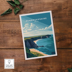 Pembrokeshire Print Wales showcasing stunning coastline and vibrant colors on a wooden background.