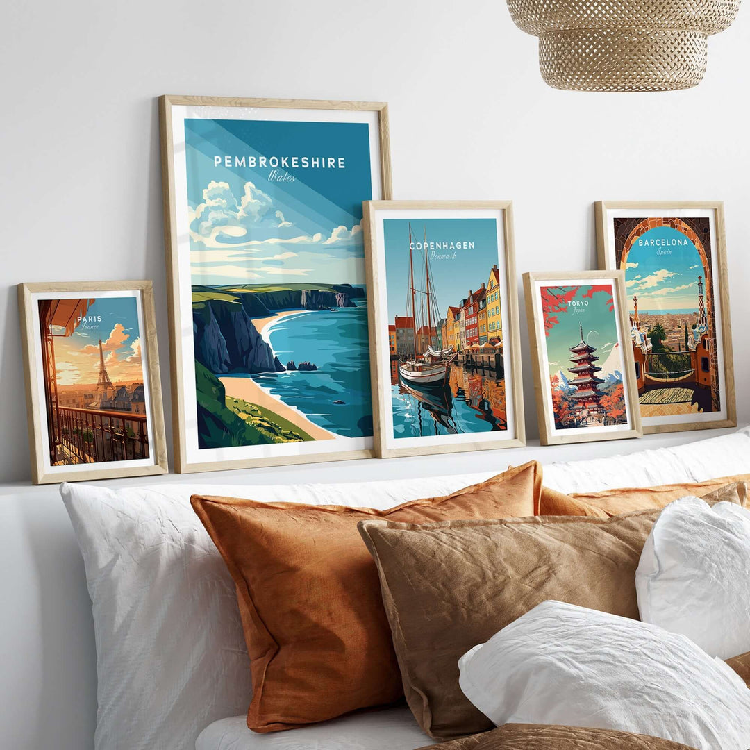 Pembrokeshire Print Wales showcased in a cozy living room setting with vibrant coastal artwork and decorative pillows.