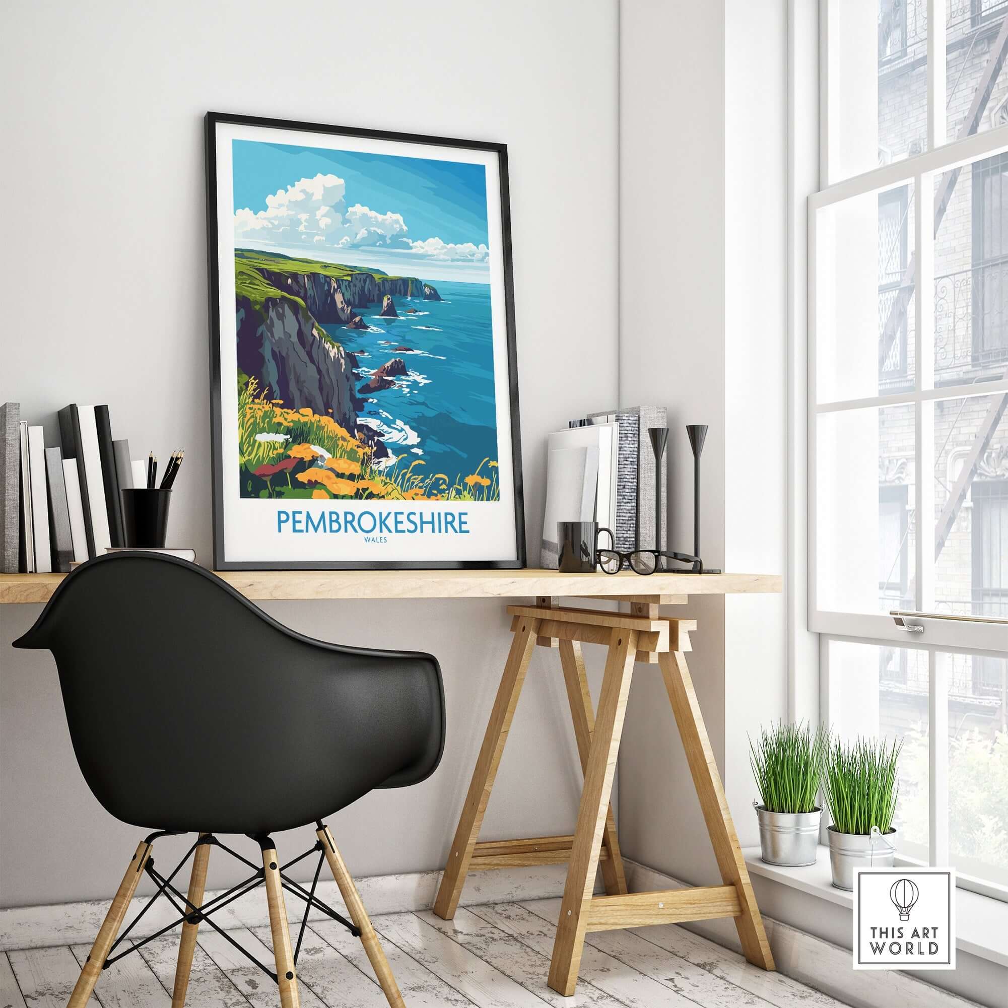 Pembrokeshire Travel Poster showcased in a stylish office setting with coastal views and modern decor.