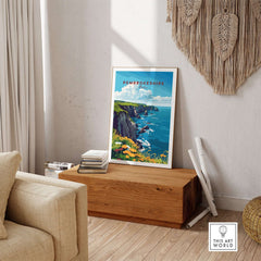 Pembrokeshire Travel Print displayed in a stylish living room setting, highlighting the coastal scenery.