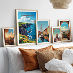 Pembrokeshire Travel Print framed among other travel prints on a stylish home decor wall.