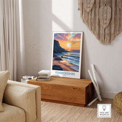 Pembrokeshire Wales Travel Poster showcasing a golden sunset over a scenic beach in Pembrokeshire.