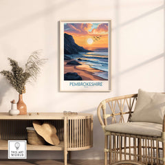 Pembrokeshire Wales Travel Poster featuring a golden sunset and scenic beach view.