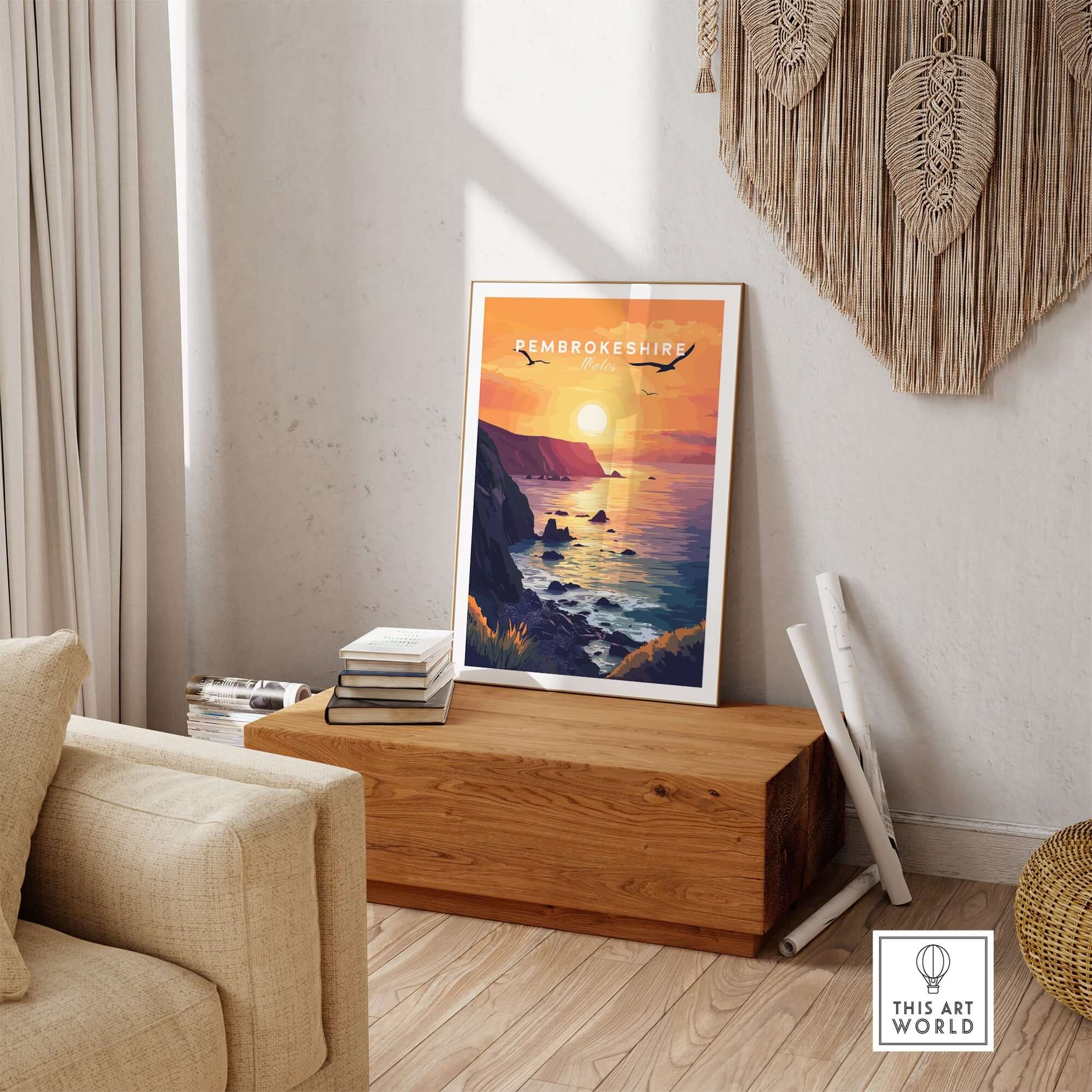 Pembrokeshire Wales Wall Art featuring a vibrant sunset and coastal scenery in a stylish living room setting.