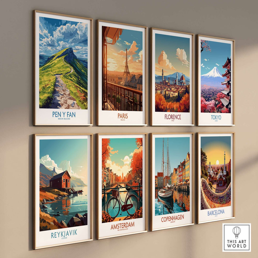 Colorful travel posters on a wall featuring Pen Y Fan, Paris, Florence, Tokyo, Reykjavik, Amsterdam, Copenhagen, and Barcelona.