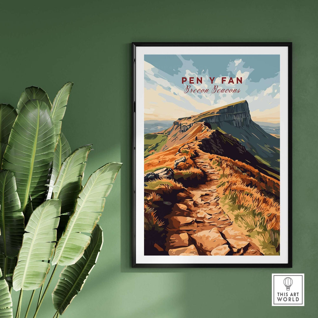 Pen Y Fan travel print featuring vibrant artwork of the Brecon Beacons landscape in Wales, framed on a green wall.