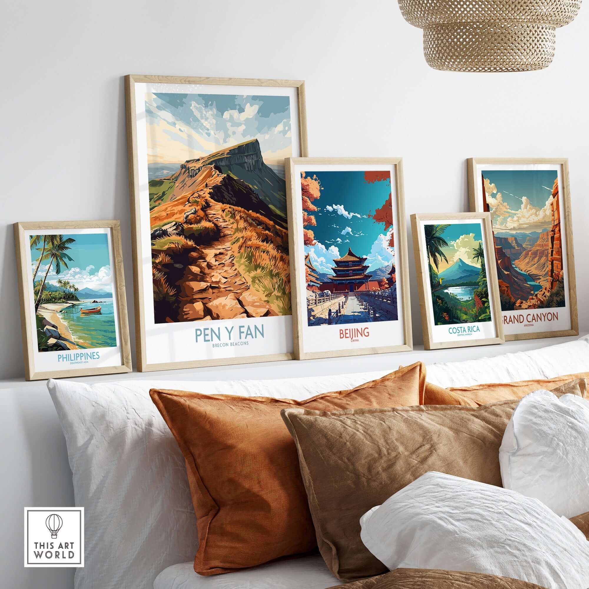 Pen Y Fan Wall Art Brecon Beacons Wales displayed among other destination artwork on a stylish shelf.