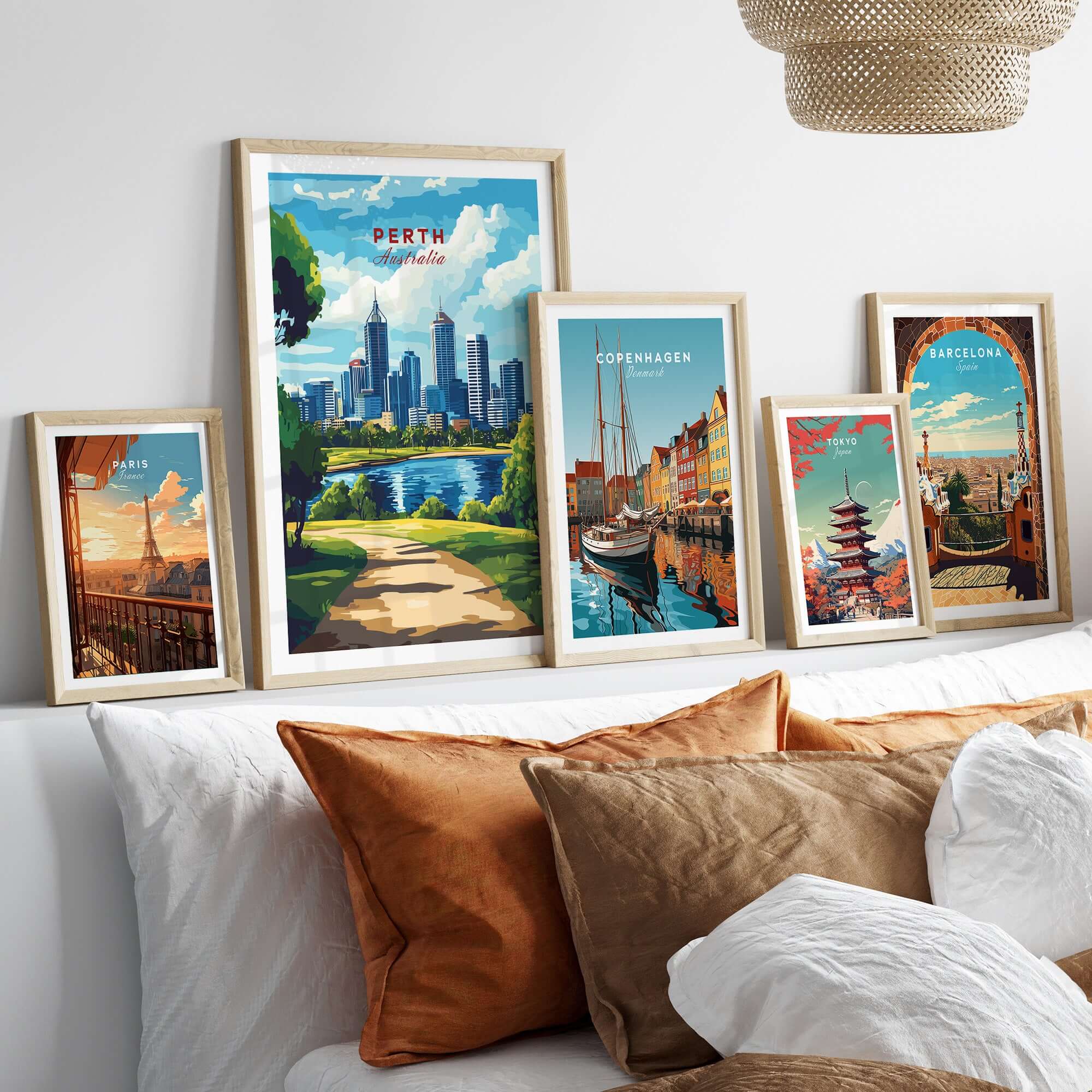 Perth Australia Wall Art - Skyline Poster Print featured among framed travel posters on a cozy sofa.