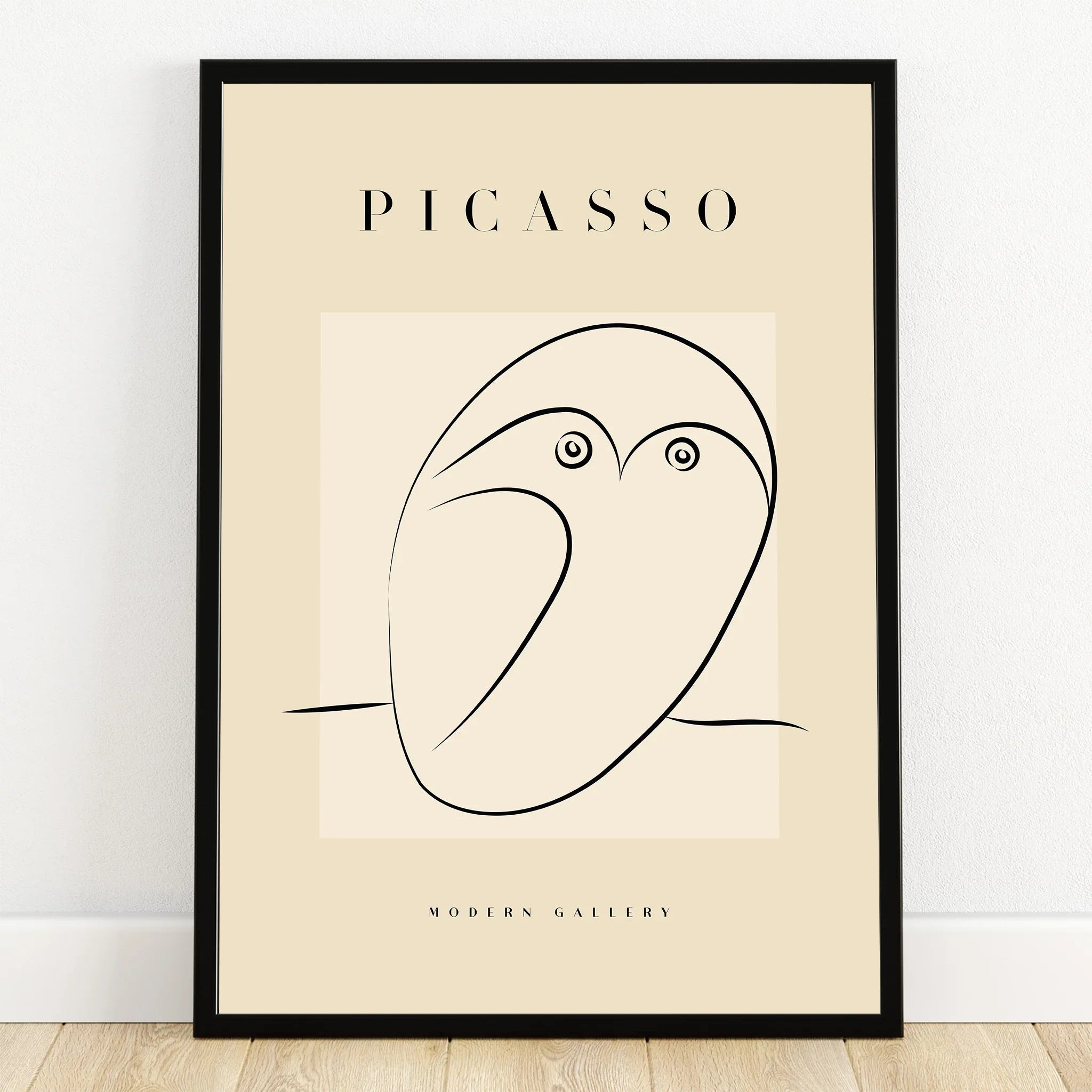 Minimalist Picasso style owl line art print in black frame, modern wall decor