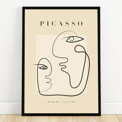 Minimalist Picasso line art print in black frame, abstract faces wall decor
