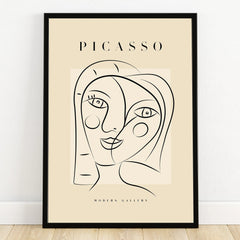 Minimalist Picasso line art portrait print in black frame, modern gallery wall art